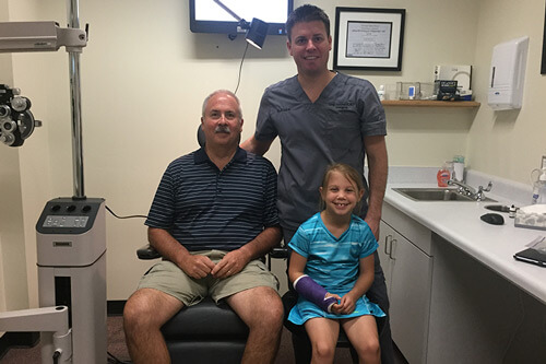 Dr. Parkhurst & Dad with child in office