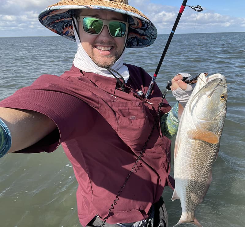 Teddy holding a fish