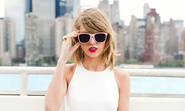 taylor swift wearing glasses in the city