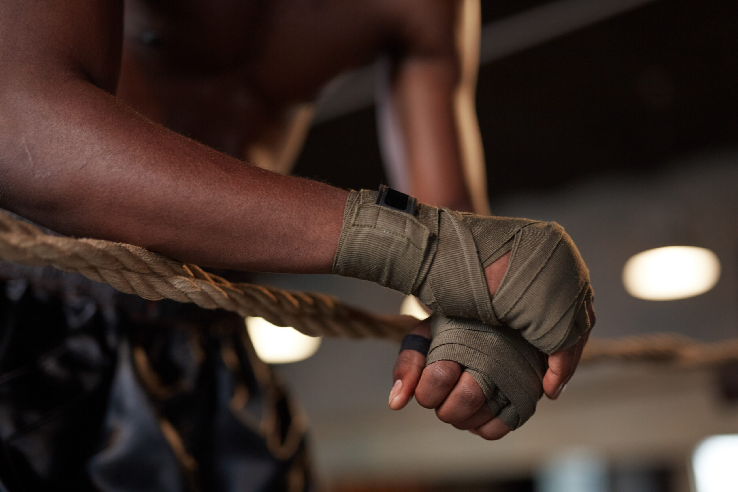 boxer hand wraps on side of ring