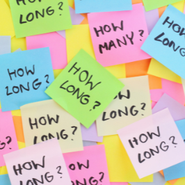 multiple colored sticky notes that all say 'how long?'
